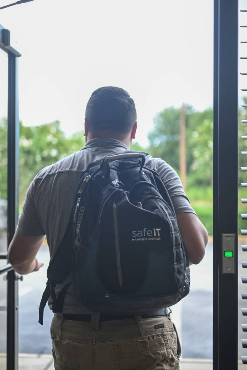 mike walking out of safeit.